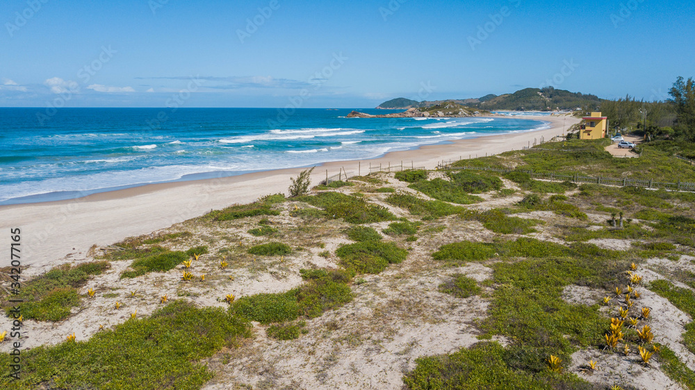 Aerial view of Ferrugem beach - Garopaba. Beautiful beach in Santa Catarina, Brazil Aerial view of Ferrugem beach - Garopaba. Beautiful beach in Santa Catarina, Brazil