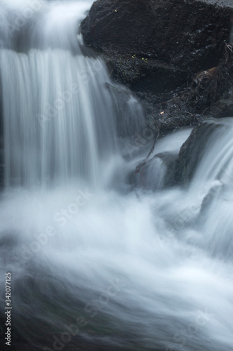 Silky, turbulent water of a small waterfall in Hebron, Connecticut.