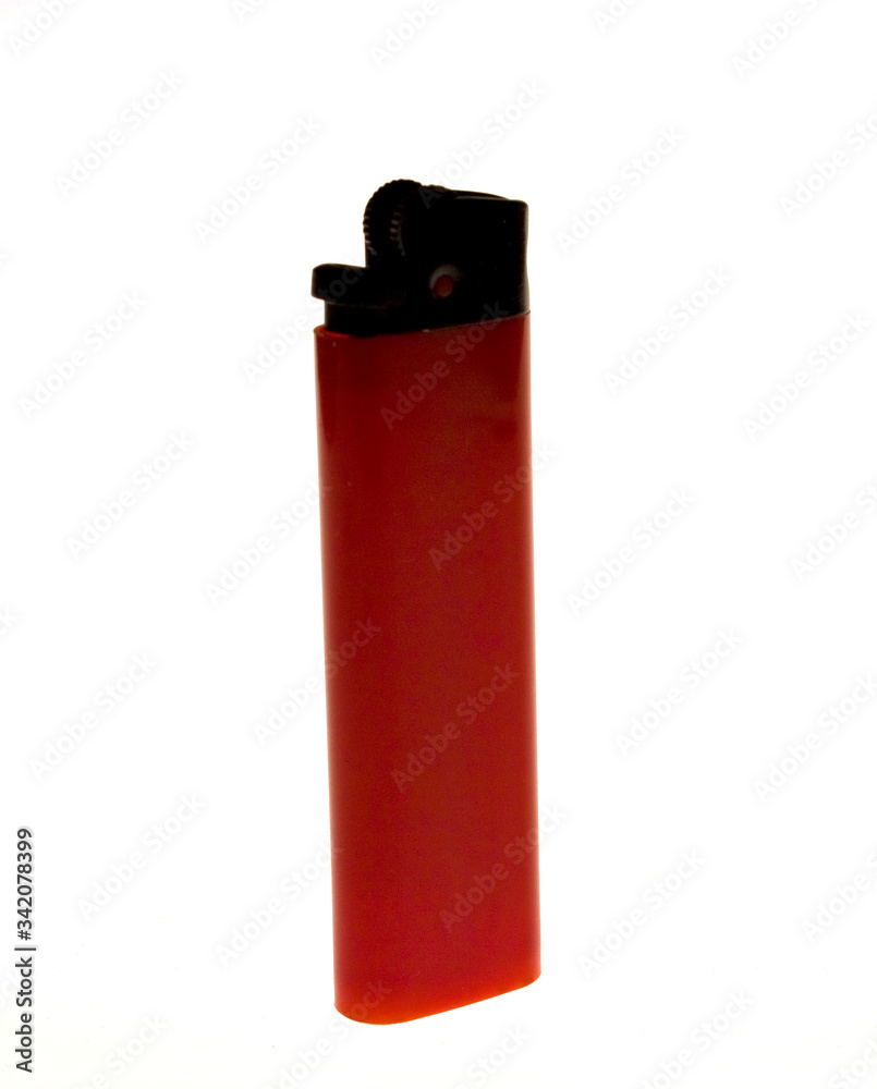 Red colored plastic lighter. Red colored plastic lighter.