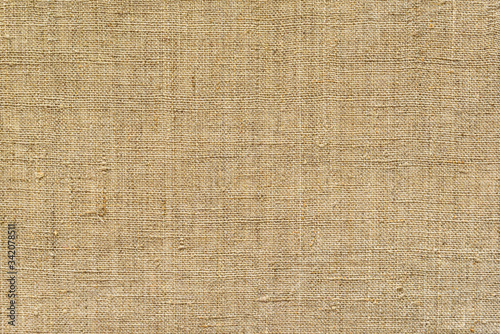 Brown, fabric background from old burlap