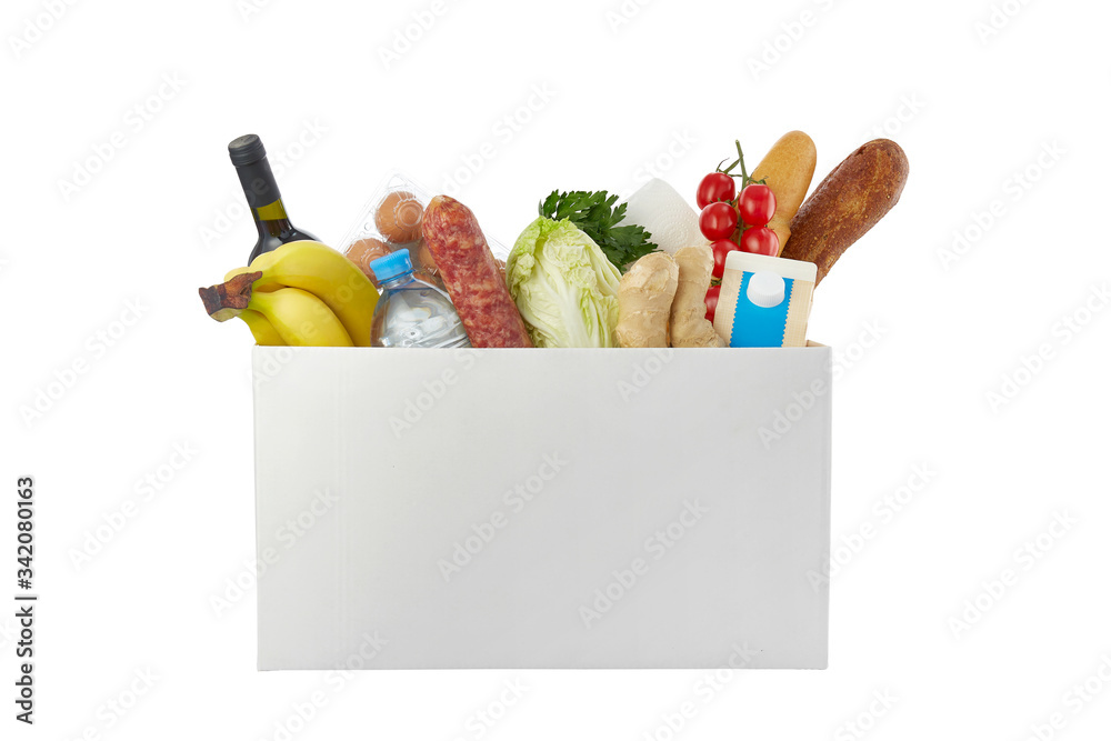 Box with different food on a white background. donation concept. Safe home delivery.