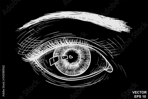 Female eye. On a chalk board. Sketch. For your design.