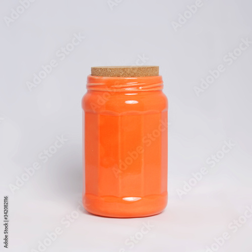 Orange ceramic jar