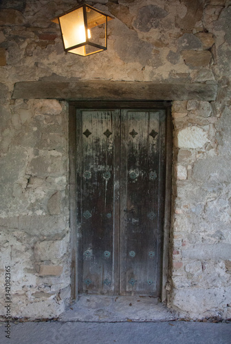 Wooden door in a rock wall
