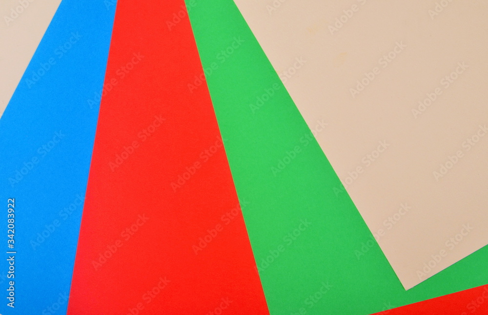 Obraz premium Red, green, blue and cream colored papers. Colored Papers Sheets Illustration background material design