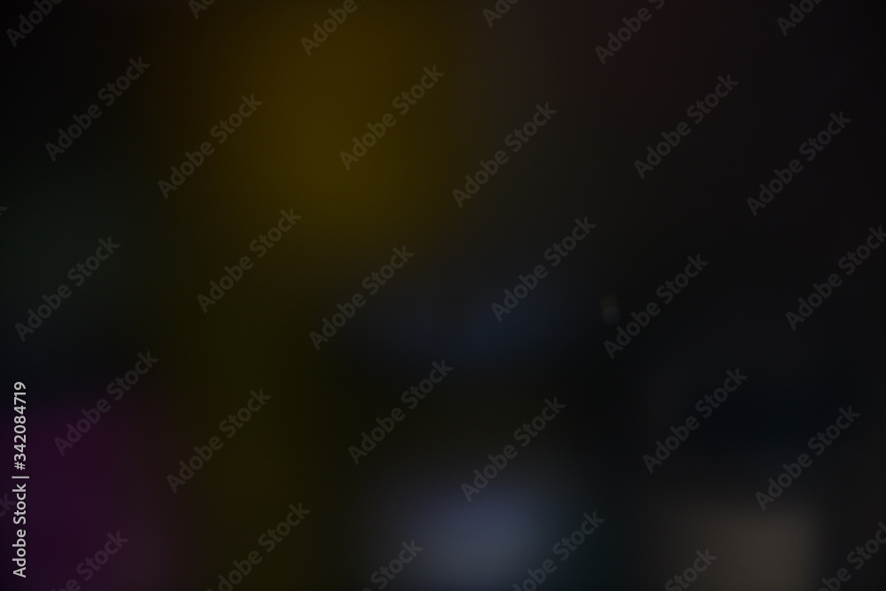 Colorful dark blurred background with spots, lines and patterns Colorful dark blurred background with spots, lines and patterns