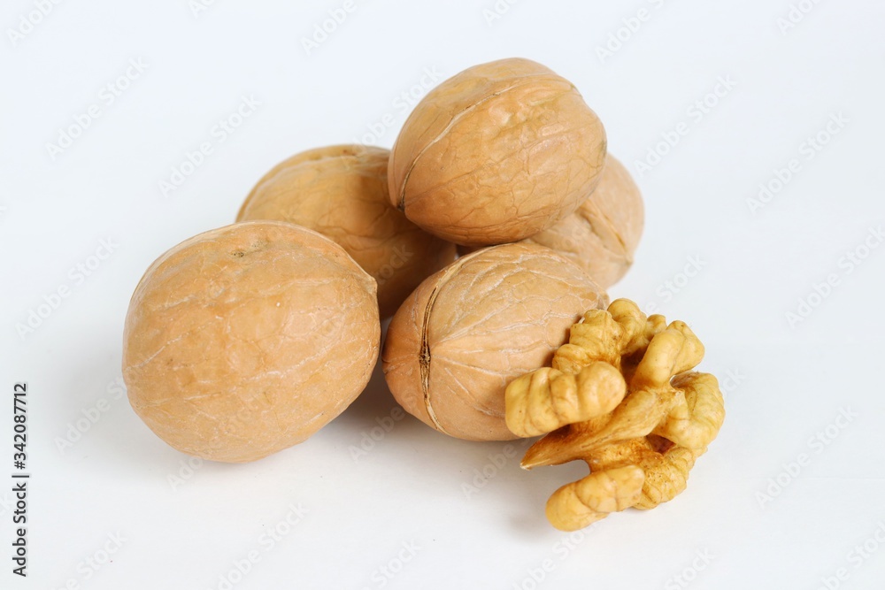 Walnut on a white background. Healthy food, nuts Walnut on a white background. Healthy food, nuts