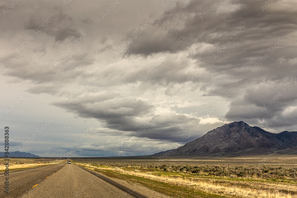 A Lonely Long Road with a Stunning Scenic Landscape View A Lonely Long Road with a Stunning Scenic Landscape View