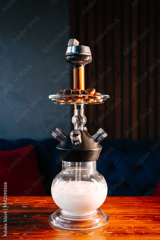 Milk based shisha with sweet tobacco and chocolate fudge in a vase as a