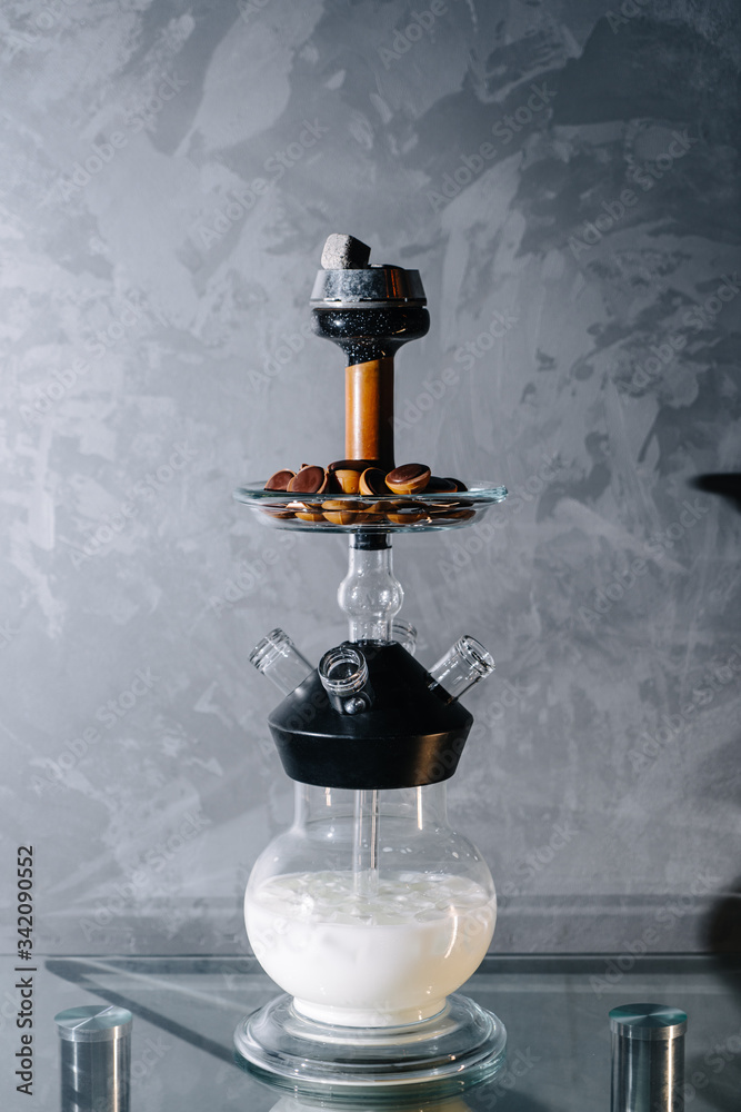Milk based shisha with sweet tobacco and chocolate fudge in a vase as a