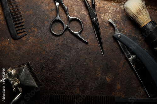 vintage barber tools dangerous razor hairdressing scissors old manual clipper comb shaving brush. flat lay. copy space