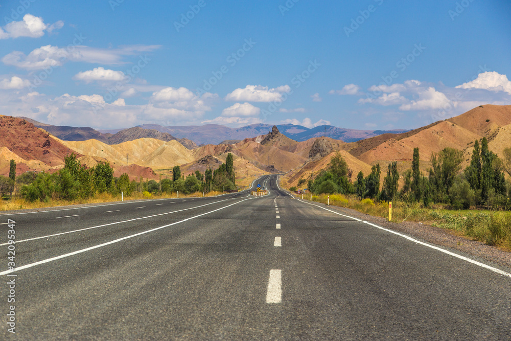 A Lonely Long Road with a Stunning Scenic Landscape View