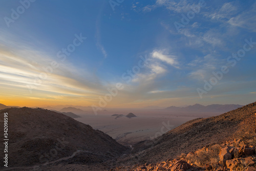 Sunset during dust storm in the Namib Desert © hannesthirion