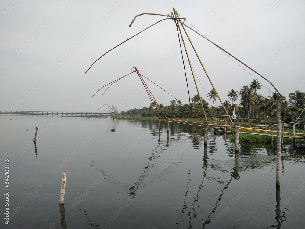 Chinese fishing nets for bulk fishing at vembanad lake, kumarakom, kerala