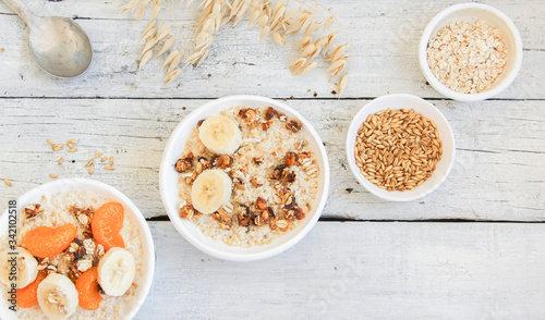 Frühstück Porridge Haferflocken Müsli Hafer Flocken Banane Madarine Karamell photo