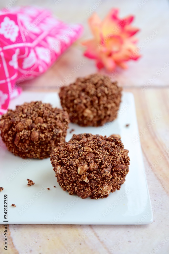Healthy dessert chocolate cups with puffed quinoa and amaranth, cocoa powder, almond butter, maple syrup and coconut butter Healthy dessert chocolate cups with puffed quinoa and amaranth, cocoa powder, almond butter, maple syrup and coconut butter