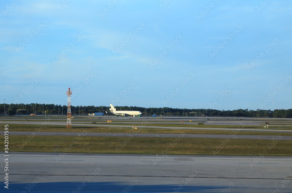 Unmarked cargo jet aircraft on the airport tarmac Unmarked cargo jet aircraft on the airport tarmac