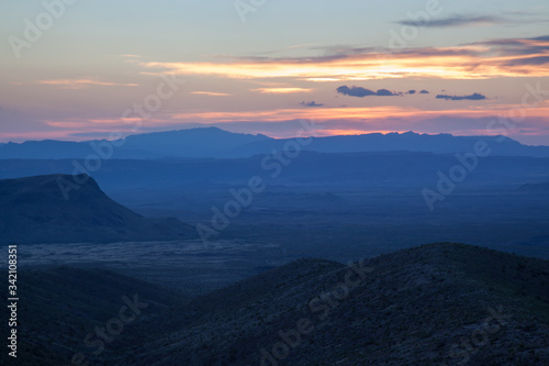 Fototapeta Naklejka Na Ścianę i Meble -  Sunset in the desert with mountains