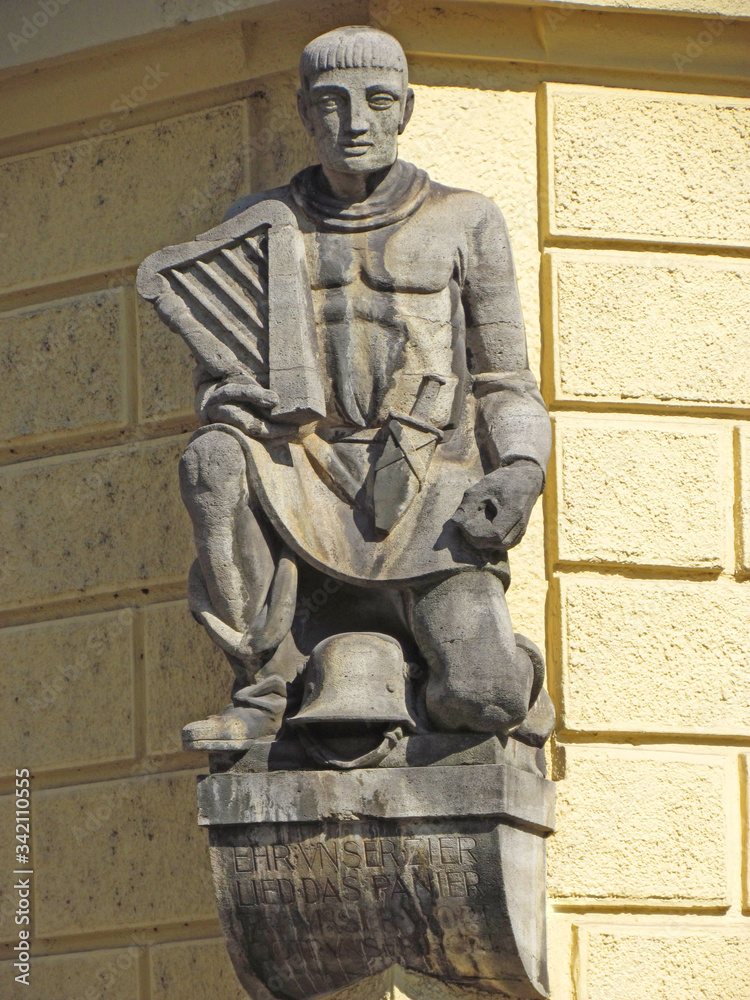 Obraz premium Sculpture of a German military musician on a street in the center of Munich. Germany, Munich, August 2013