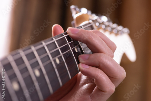 Playing chords on the guitar