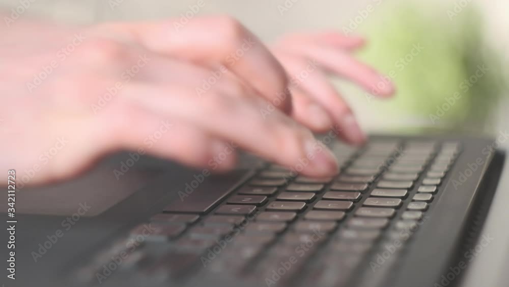 Woman hands on Computer Keyboard.
Close-up of fast-typing hands. Home office. Woman hands on Computer Keyboard.
Close-up of fast-typing hands. Home office.