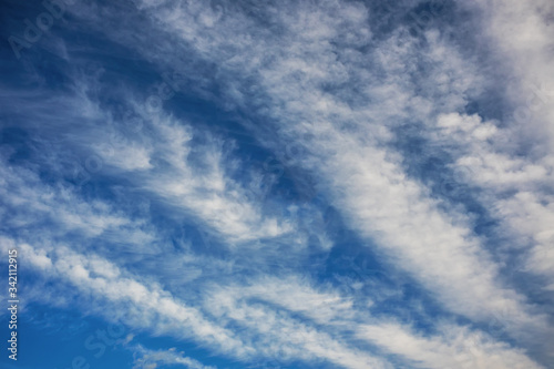 Fototapeta Naklejka Na Ścianę i Meble -  Nature background: Elongated clouds against the blue sky