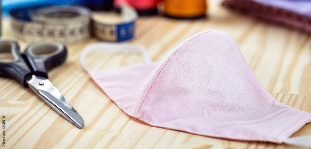 handmade respiratory mask, made at home to contain airborne epidemics, pandemics, such as the coronavirus. handmade respiratory mask, made at home to contain airborne epidemics, pandemics, such as the coronavirus.