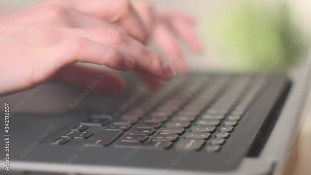 Woman hands on Computer Keyboard.
Close-up of fast-typing hands.