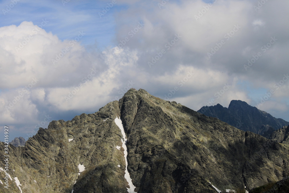 Fototapeta premium Poland Tatras Rysy. Clouds over the mountains