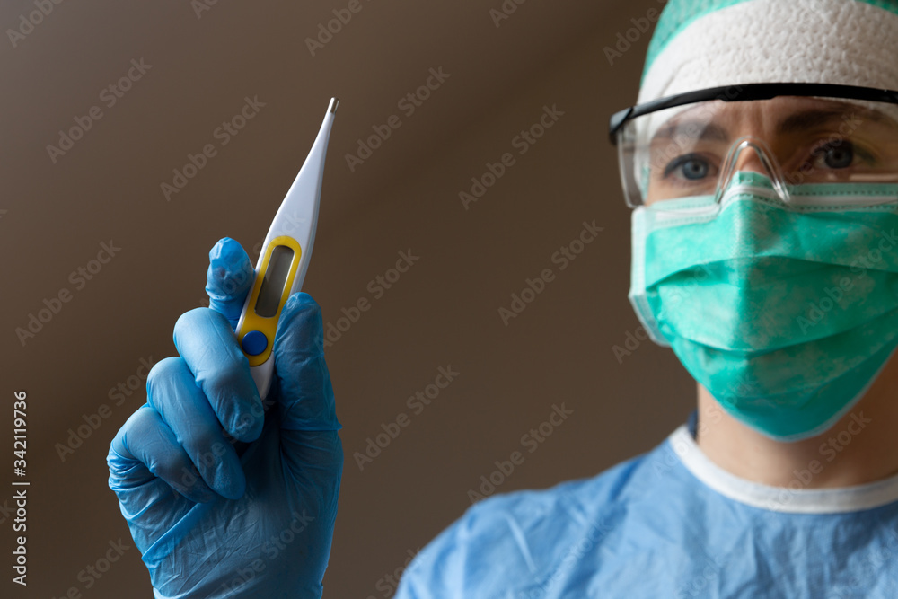 A nurse wearing a facial mask. Protection and hard working nurses concept. A nurse wearing a facial mask. Protection and hard working nurses concept.