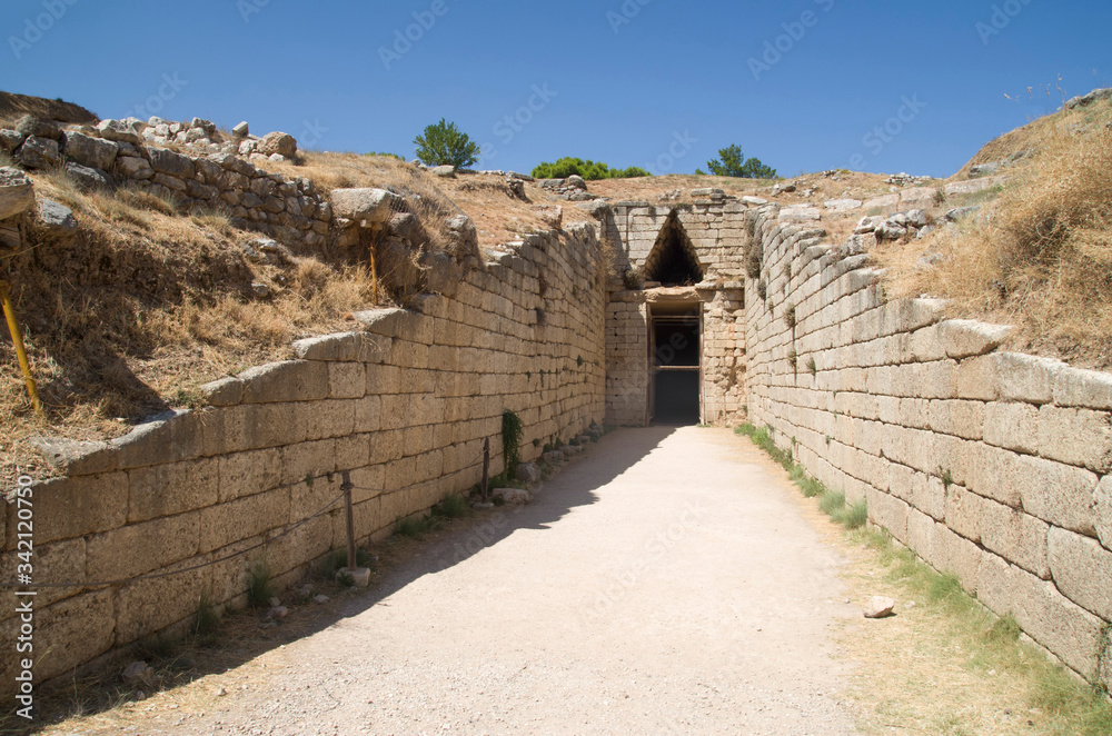 Dromos entrance to tholos tomb of Aegisthus in Mycenae, Greece Dromos entrance to tholos tomb of Aegisthus in Mycenae, Greece
