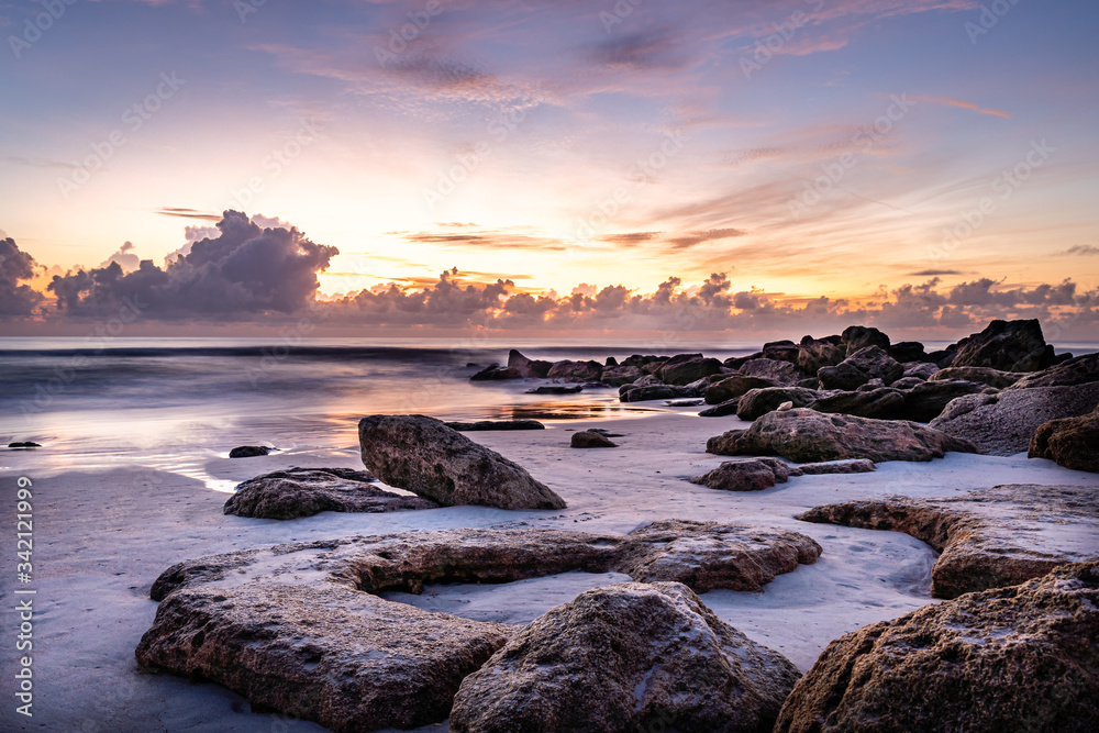 Sunrise Florida Beach with boulders