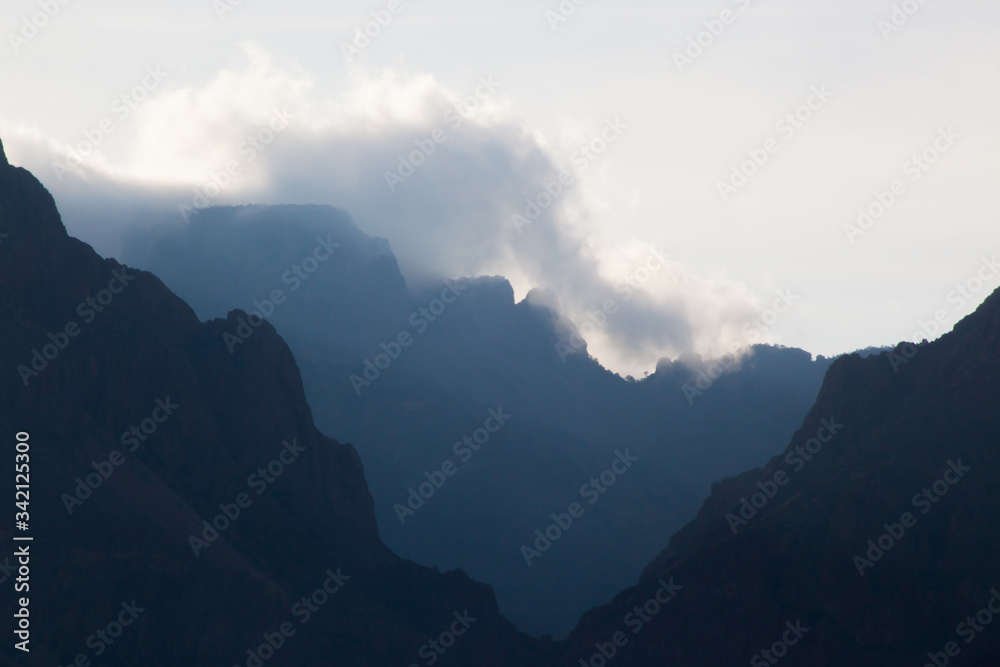 Distant mountain with clouds outdoors