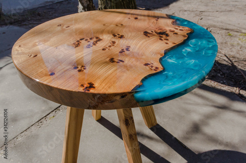 beautiful wooden table top made of slab and epoxy resin photo