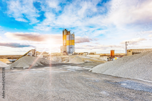 Quarry for the extraction of sand and stone, its transformation into gravel and cement manufacturing