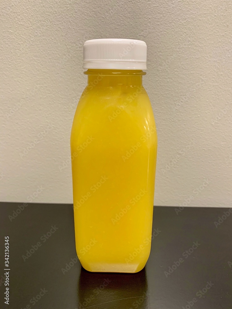 Natural juice made with pineapple, orange, pear, orange, echinacea, and green tea for improved health and immunity Natural juice made with pineapple, orange, pear, orange, echinacea, and green tea for improved health and immunity