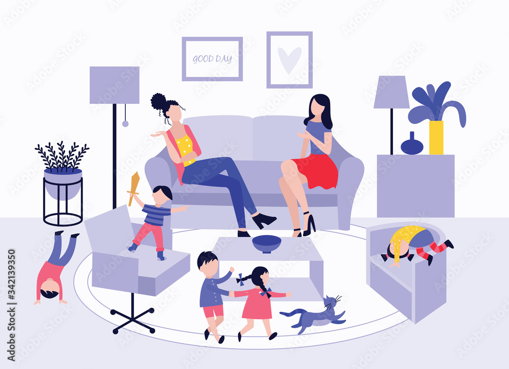 Obraz premium Two mothers at children's play date sitting on sofa and talking.