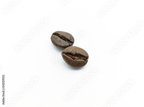 Roasted coffee beans on a white background cutout