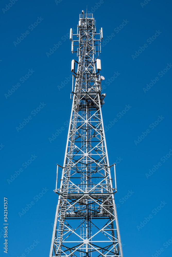 Communication tower with clear blue sky Communication tower with clear blue sky