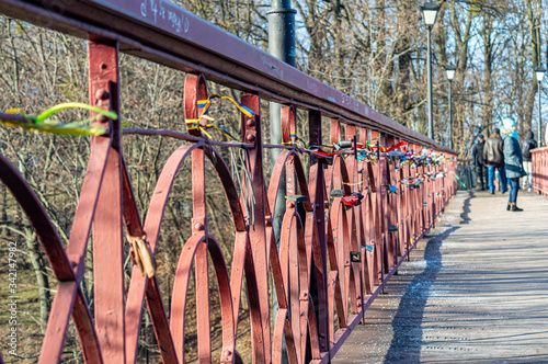 Parkovy Bridge with lot of love locks designed by Paton in Kyiv, Ukraine on January 12, 2020.  photo