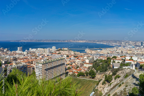Fototapeta Naklejka Na Ścianę i Meble -  The amazing areal view on Marseille from mountain where is church od Notre Dame de la Guarde , France