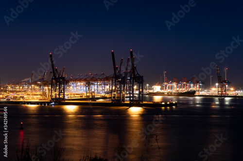 Hamburg harbor: container terminal in the port of Hamburg at night