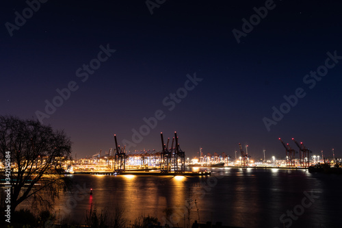 Hamburg harbor: container terminal in the port of Hamburg at night