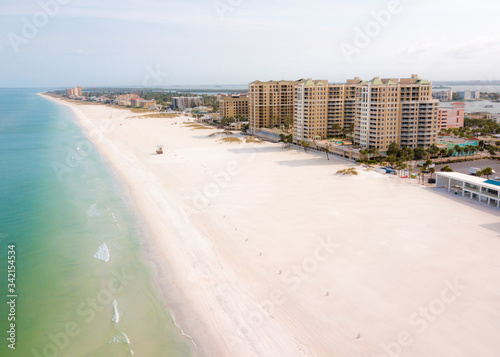 Clearwater Beach Florida. Coast or shore Gulf of Mexico. Spring or summer vacation. Beautiful color ocean water. White quartz sand.