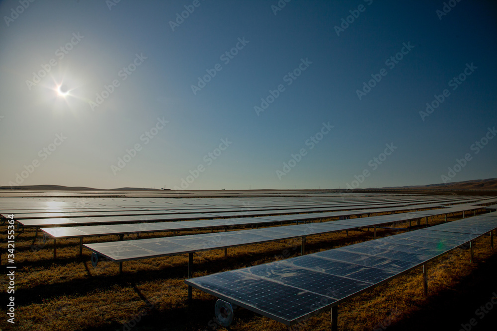 Solar Farm During Solar Eclipse - Solar Panels 