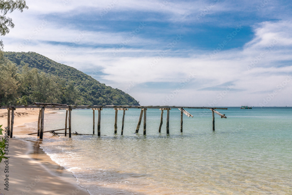 Old wood pier , Sunset beach, koh rong samloem island, sihanoukville, Cambodia.
