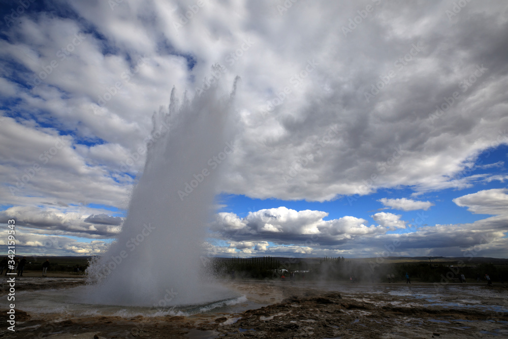 Geysir / Iceland - August 25, 2017: Strokkur geysir eruption near Golden Circle, Iceland