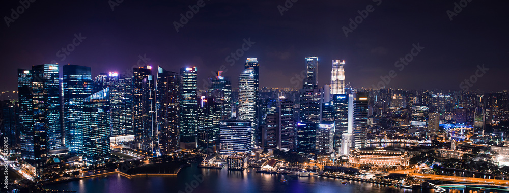SINGAPORE CITY, SINGAPORE - April 03, 2019: Areal panoramic view of Singapore business district and city, helix bridge.