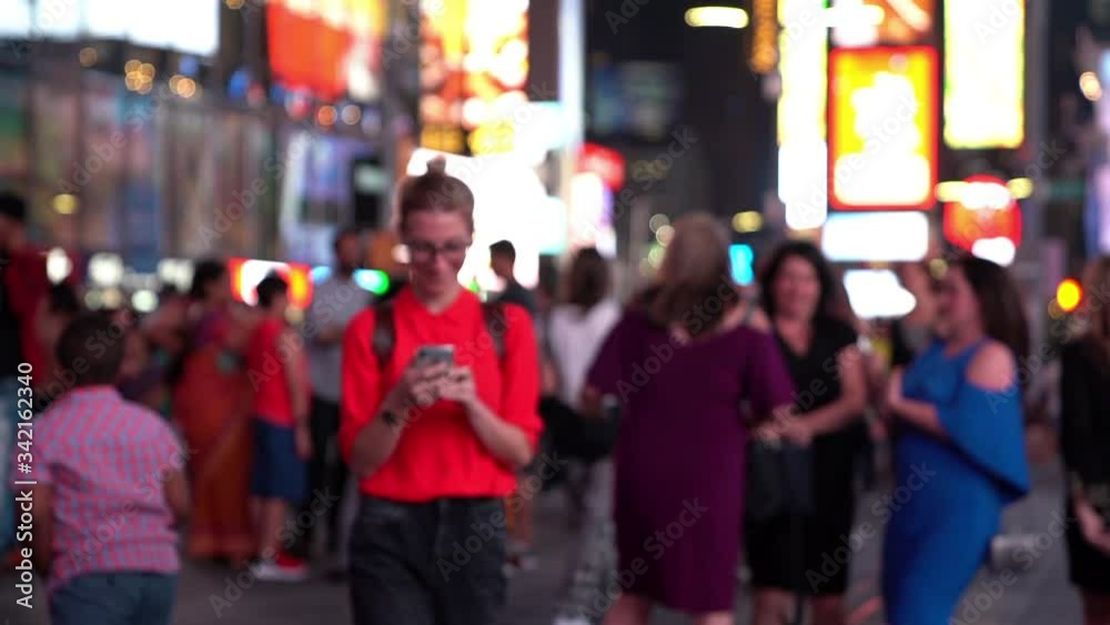 Slow motion effect of cheerful hipster girl with trendy backpack exploring metropolitan downtown taking pictures on modern smartphone gadget and smiling duirng online communication with best friend
Slow motion effect of cheerful hipster girl with trendy backpack exploring metropolitan downtown taking pictures on modern smartphone gadget and smiling duirng online communication with best friend