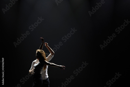 Professional dancers perform latino dance. Passion and expression photo